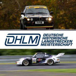 Frontansicht eines schwarzen BMW 635 CSi mit ADAC-Scheinwerferfolie und H&R-Kennzeichen auf nasser Strecke.
