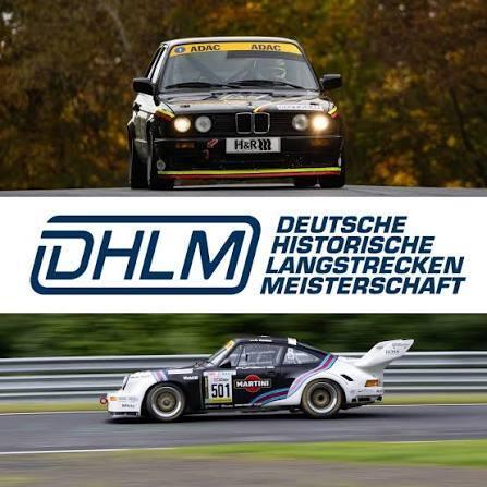 Frontansicht eines schwarzen BMW 635 CSi mit ADAC-Scheinwerferfolie und H&R-Kennzeichen auf nasser Strecke.